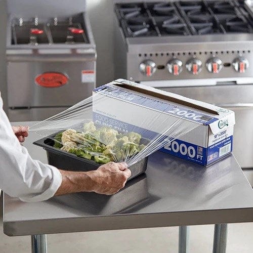 Reynolds Essentials Roll Reynolds FW11 PVC Foodservice Wrap Film - 2500' x 11" with Cutter Box | Denson CFE